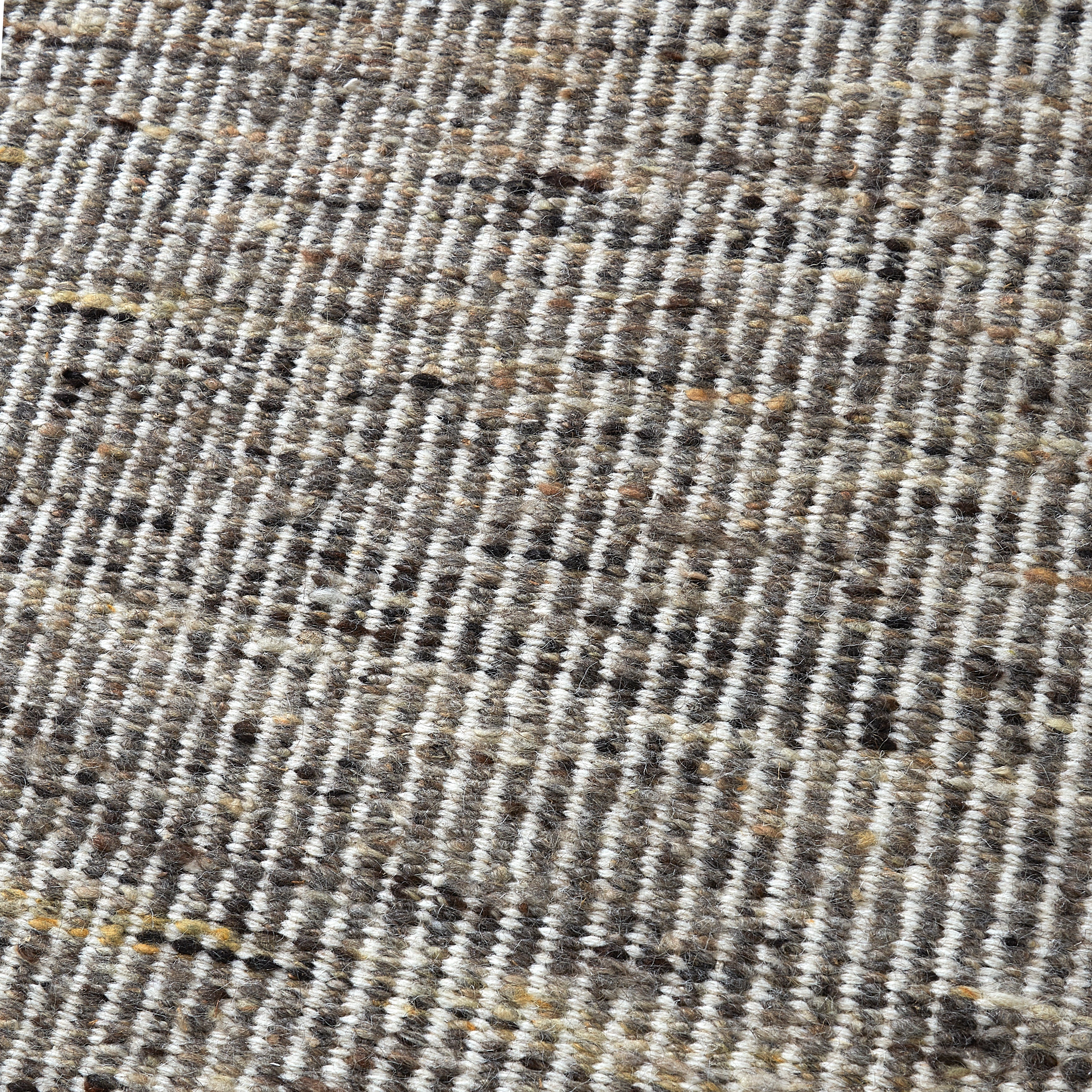 Texture close-up of neutral brown heathered wool area rug loop weave