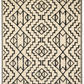 Reverse side of black and cream tribal outdoor rug with cream center