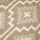 Texture close-up of mocha diamond outdoor rug showing woven diamond motif