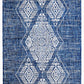 Full view of blue outdoor rug with ivory diamond medallions