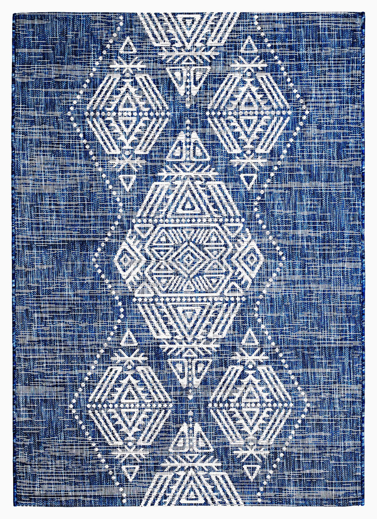 Full view of blue outdoor rug with ivory diamond medallions