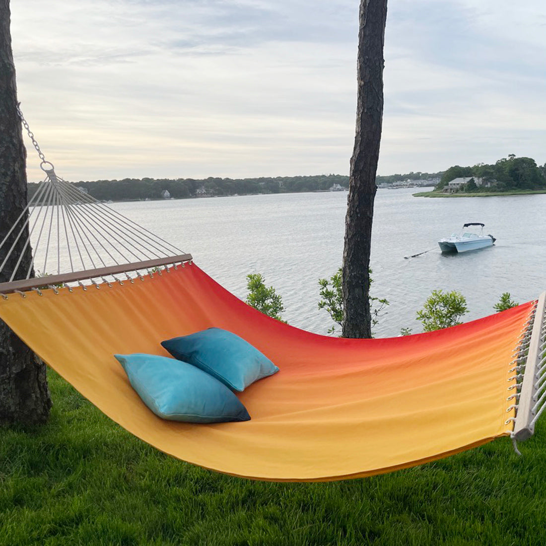 Teal Outdoor Pillow, lifestyle patio scene with pillow, second view