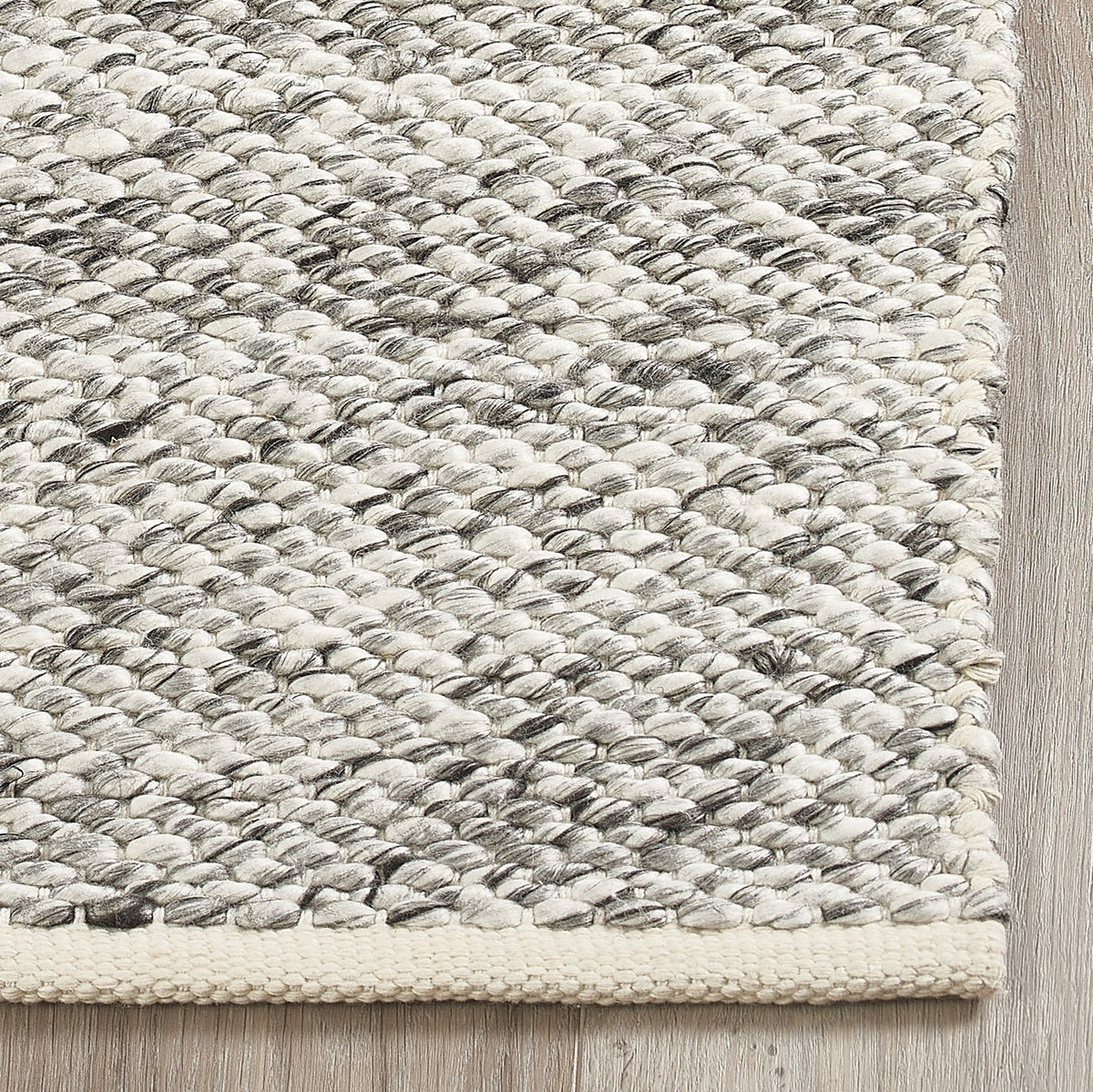 Sand Outdoor Rug, close-up of weave texture, Natural tones