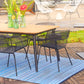 Lifestyle view of indigo and blue striped outdoor rug under patio dining table and black chairs