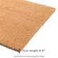 Texture close-up of plain coir doormat edge labeled pile height 0.6 inch