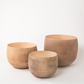 Full view of set of three empty mousse brown planters in graduated sizes