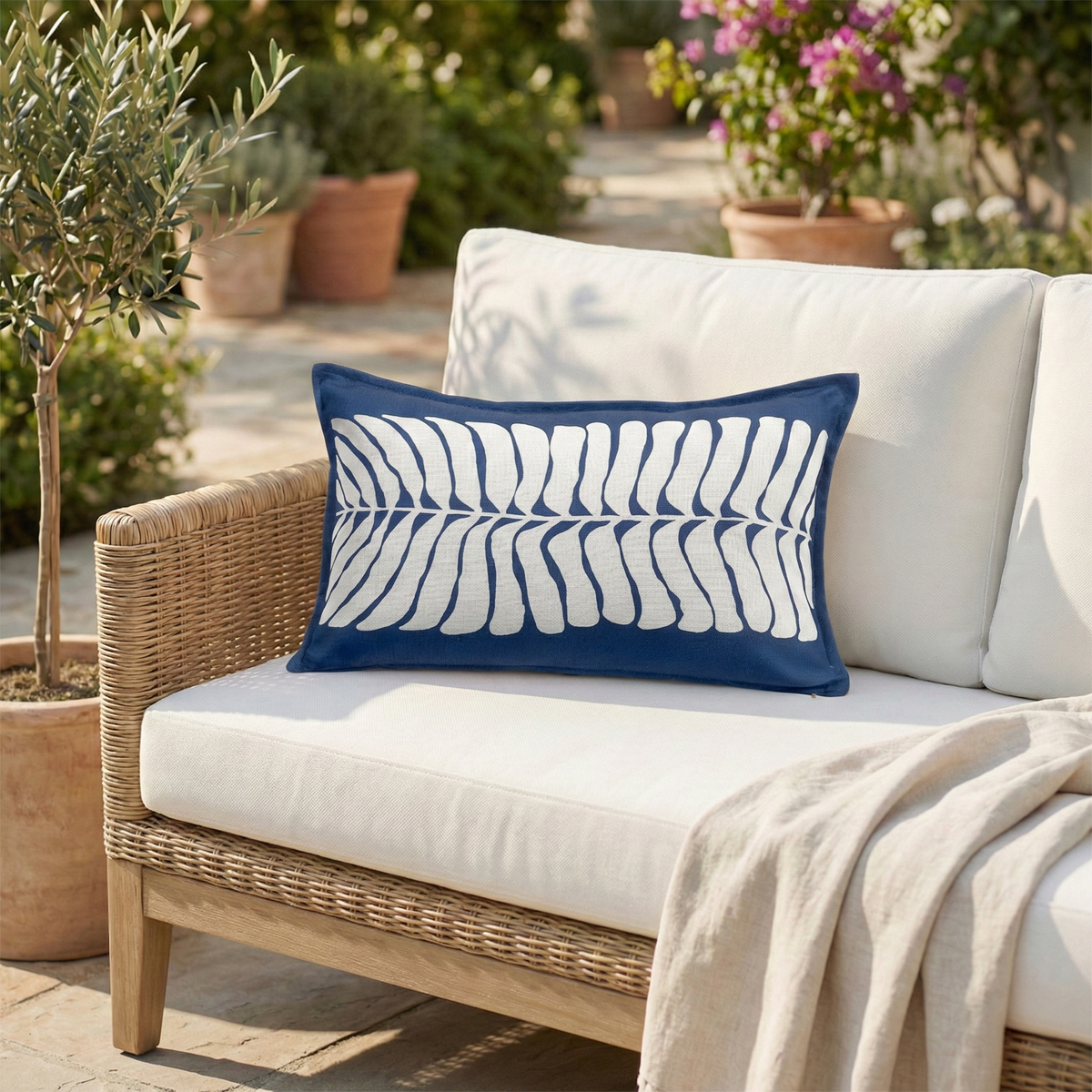 Blue Outdoor Pillow, lifestyle patio scene with pillow, detail close-up