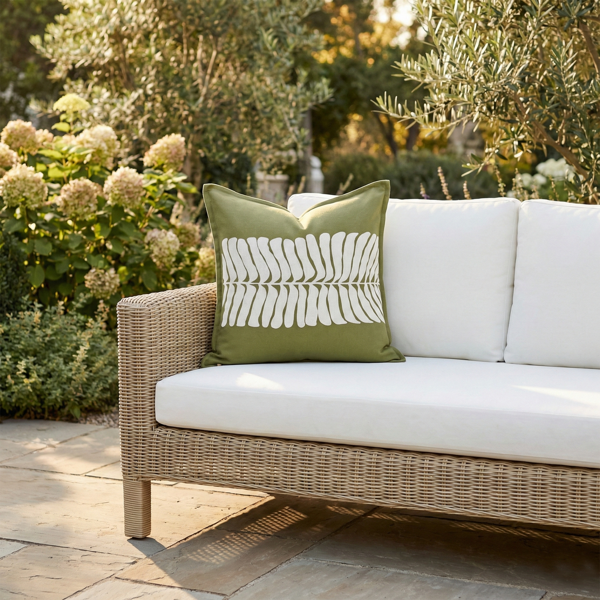 Green Outdoor Pillow, lifestyle patio scene with pillow
