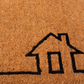 Texture close-up of black house outline on natural coir doormat