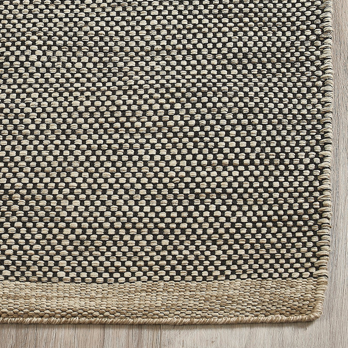 Black & Beige Outdoor Rug, close-up of weave texture