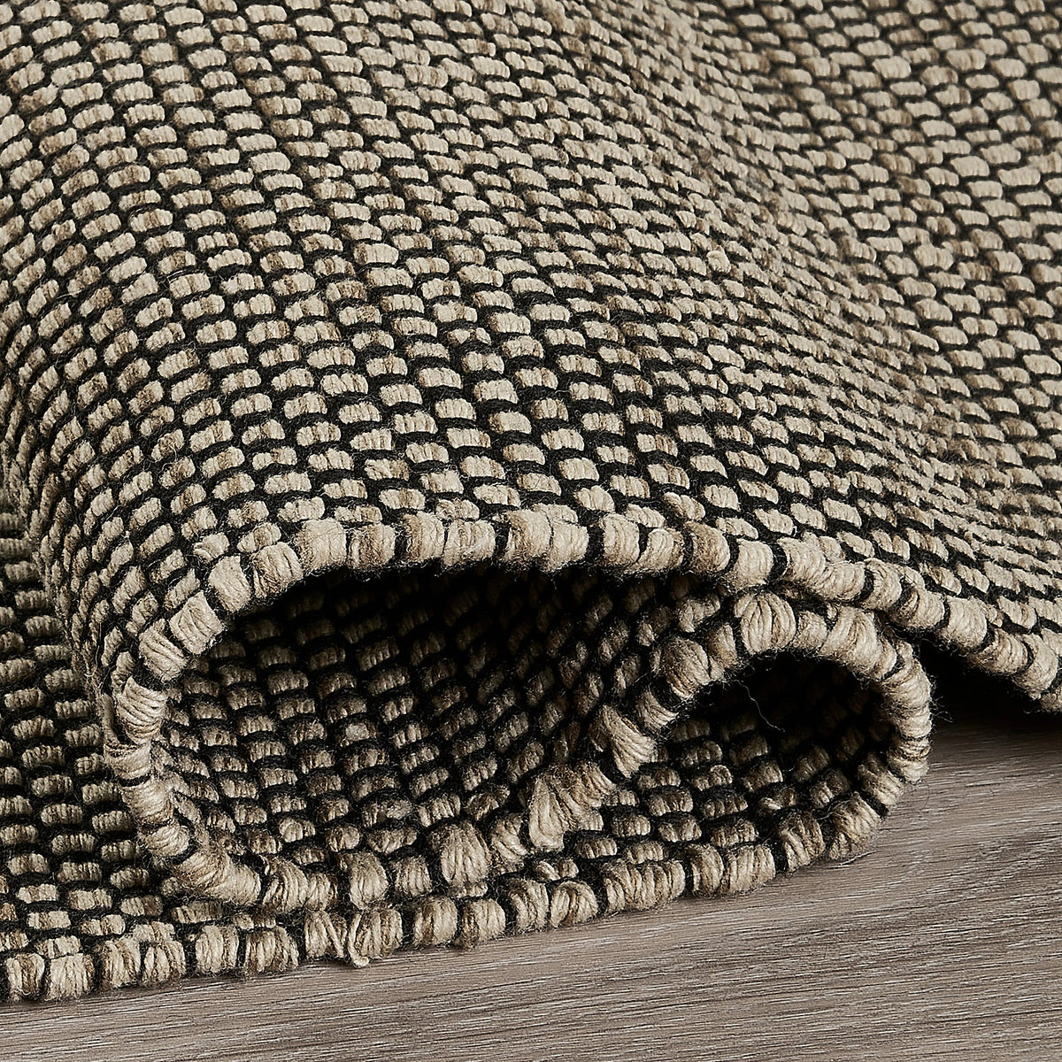 Black & Beige Outdoor Rug, close-up of pile texture