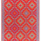 Full view of orange and violet diamond outdoor rug laid flat