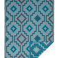 Full view of teal diamond outdoor rug with corner folded to show reverse