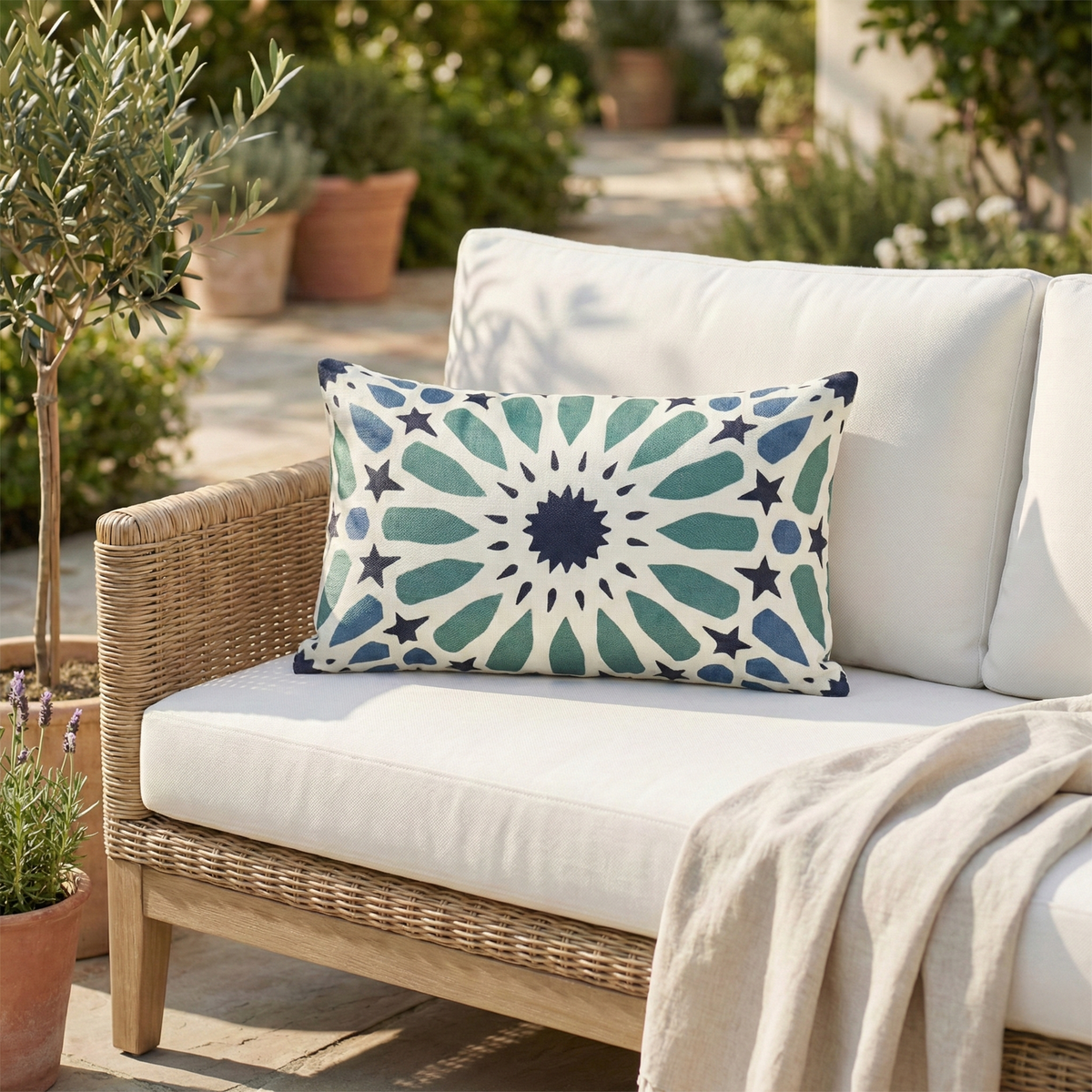 Multi Blue Outdoor Pillow, lifestyle patio scene with pillow, detail close-up