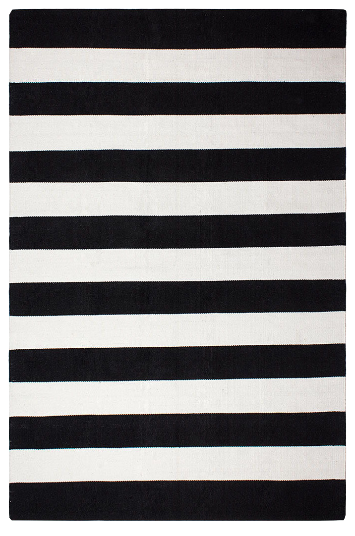 Full view of black and white striped indoor outdoor rug