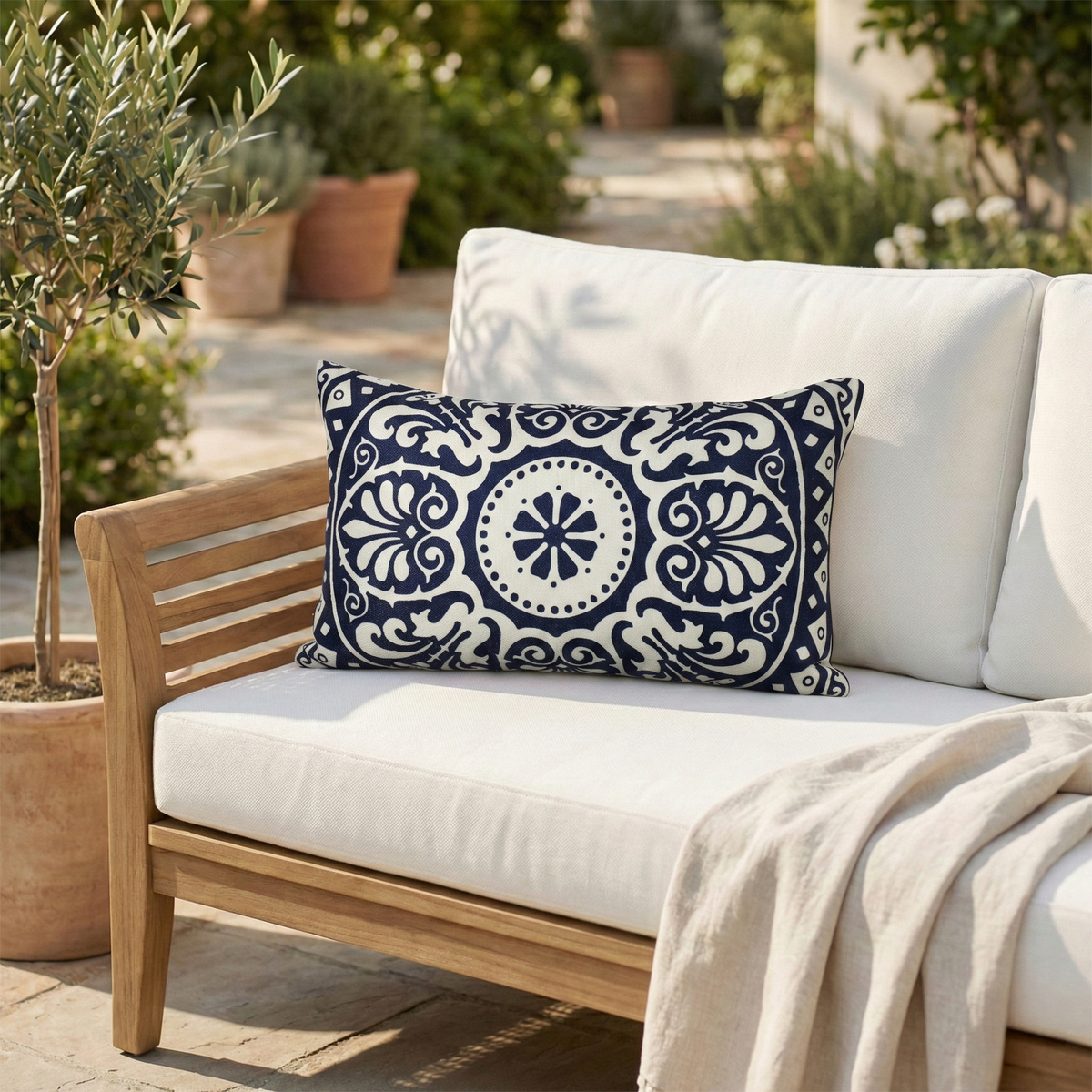 Natural & Black Outdoor Pillow, lifestyle patio scene with pillow, detail close-up