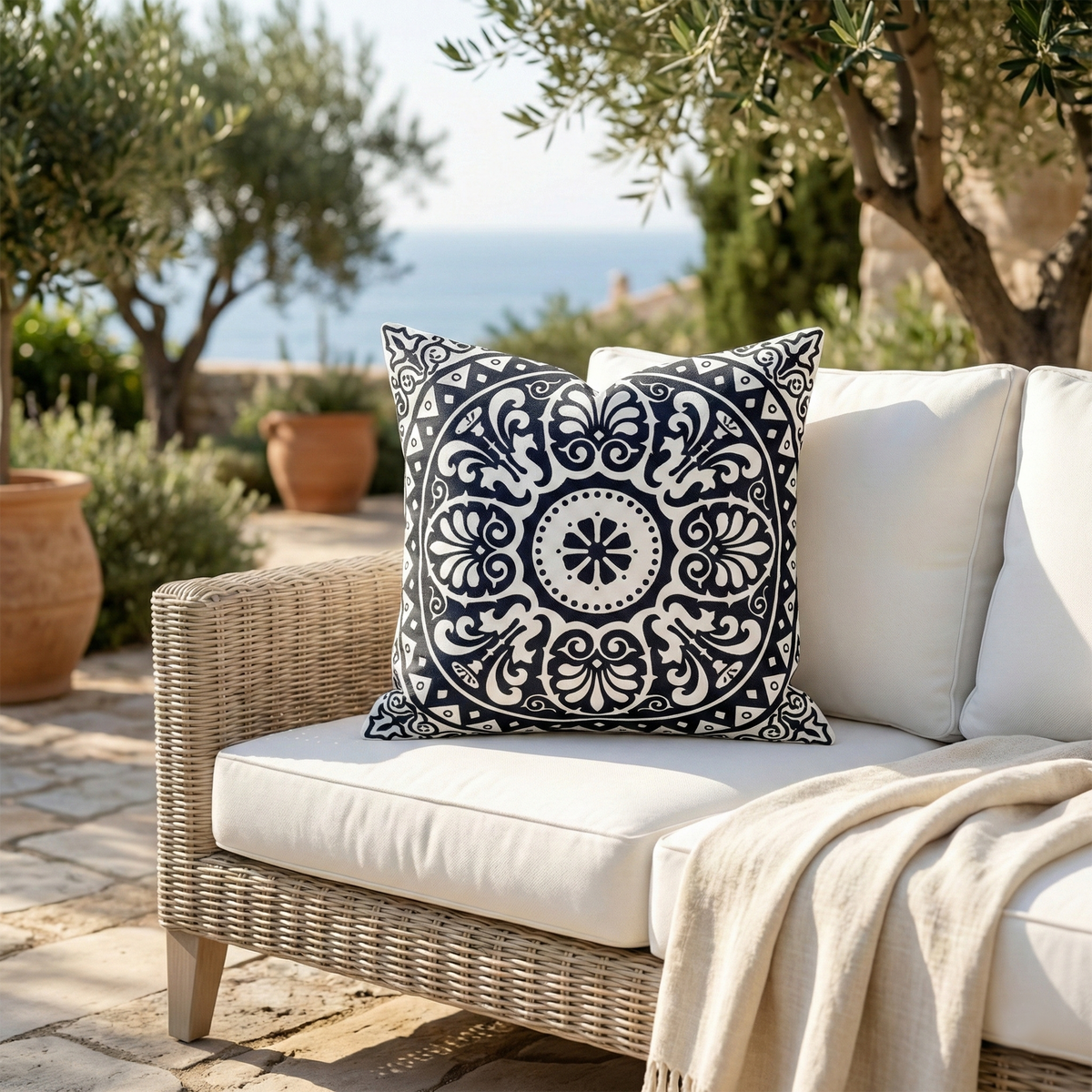 Natural & Black Outdoor Pillow, lifestyle patio scene with pillow