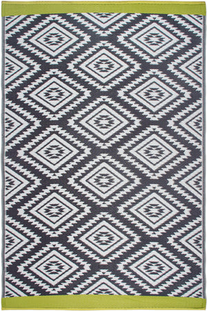 Full view of gray and white diamond outdoor rug with lime green edges