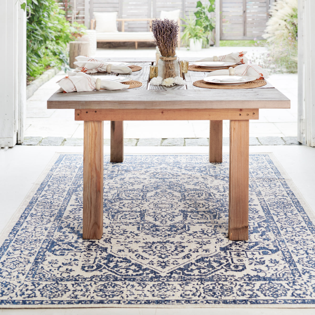 Distressed Blue Outdoor Rug, lifestyle patio scene