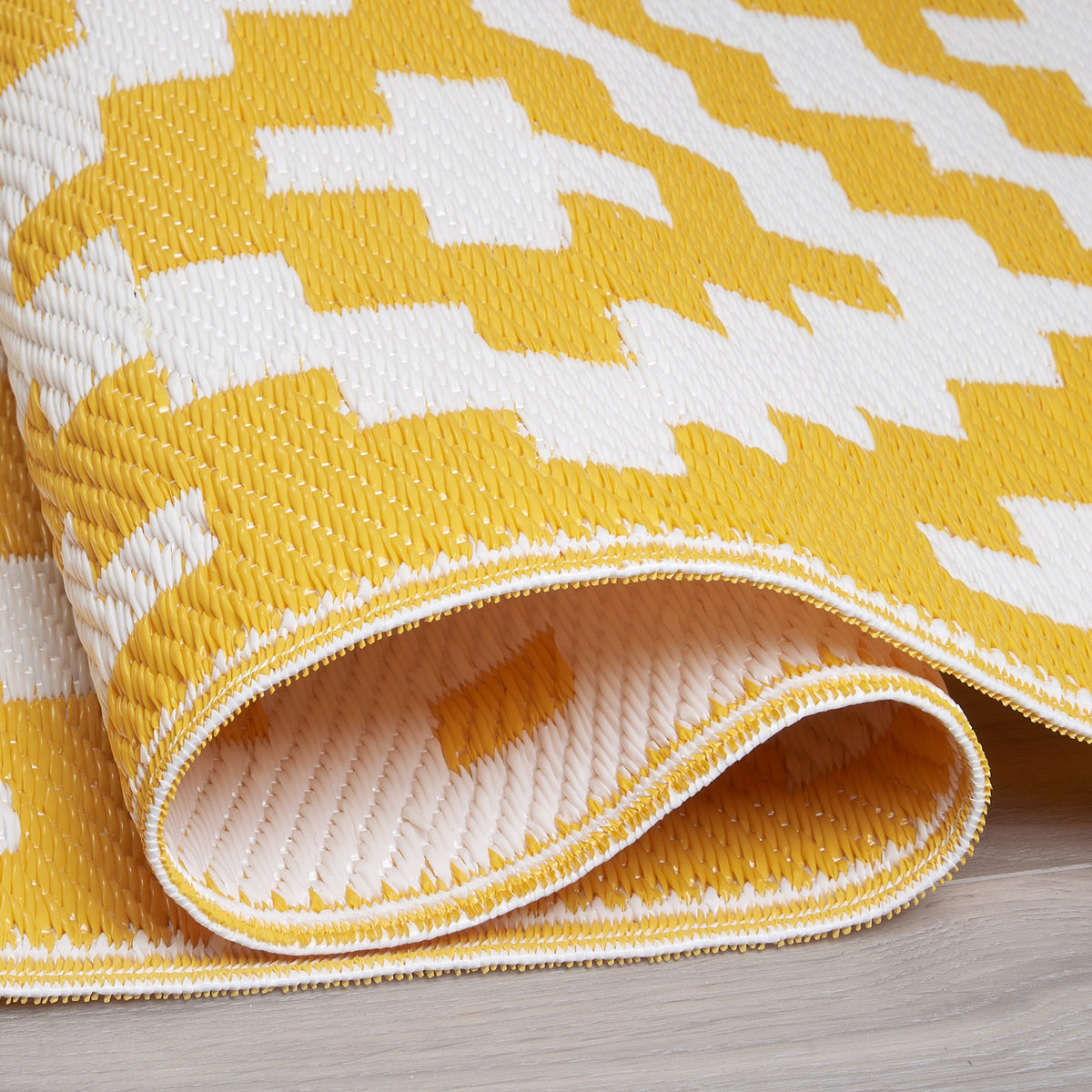 Yellow & White Area Rug, folded corner detail