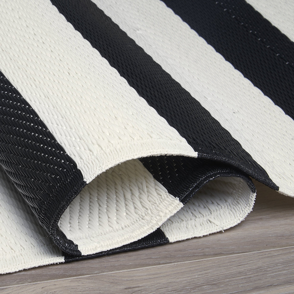 Black & White Area Rug, folded corner detail, alternate angle
