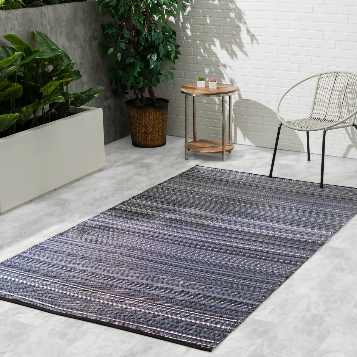 Midnight Outdoor Rug, lifestyle patio scene