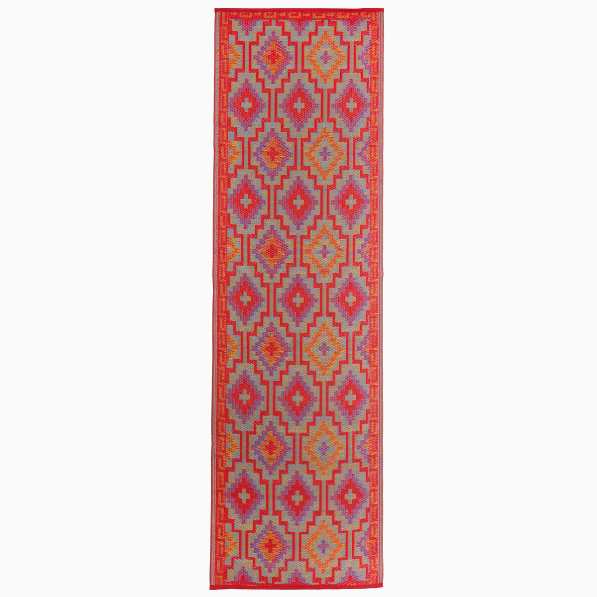 Reverse side of orange and violet diamond outdoor rug in runner size