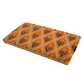 Angled view of marigold lattice coir doormat showing thick pile and floral lattice