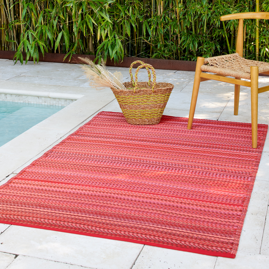 Turquoise Outdoor Rug, lifestyle video of patio seating, detail close-up