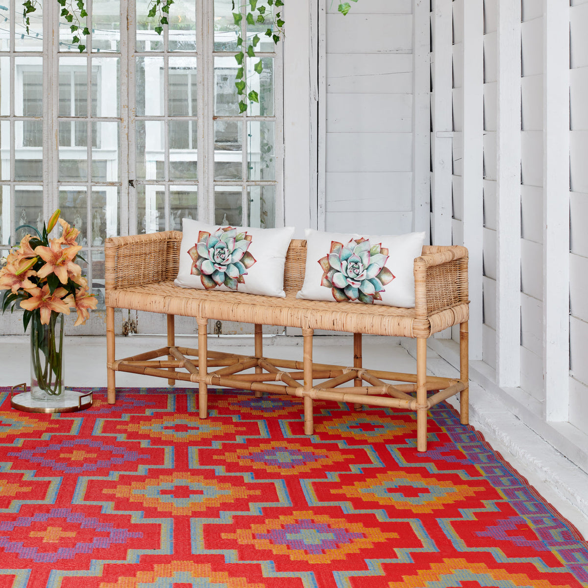 Orange & Violet Outdoor Rug, lifestyle video of patio seating, alternate angle