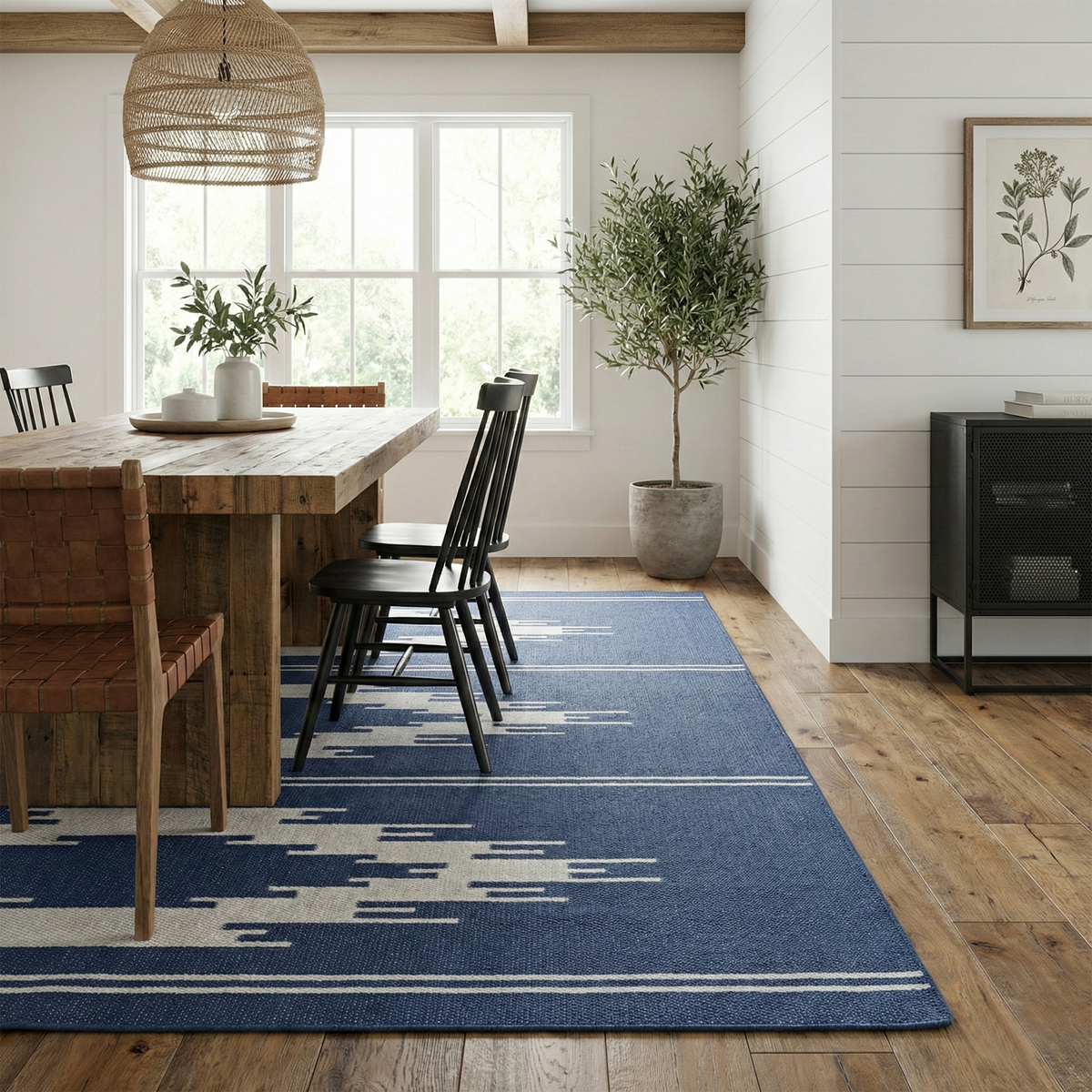 Navy & Gray Aztec Outdoor Rug, lifestyle video of patio seating, alternate angle