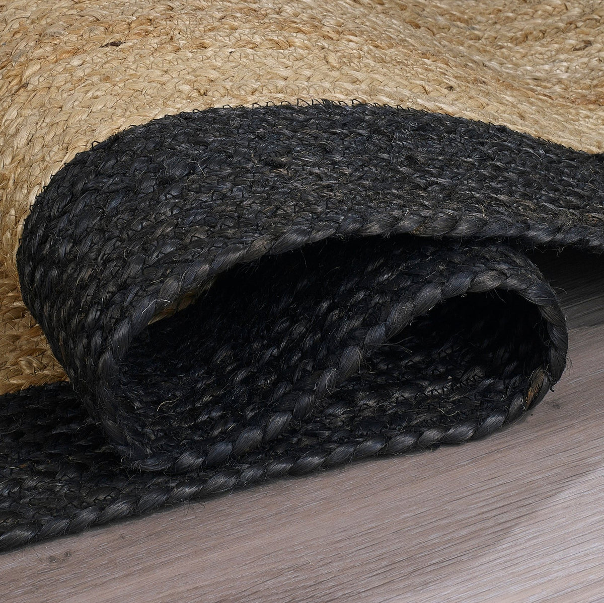 Black Indoor Rug, folded corner detail